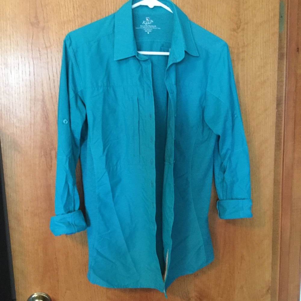 Green sports shirt.